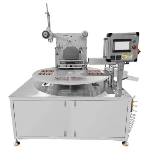 Rotary tray sealing machine